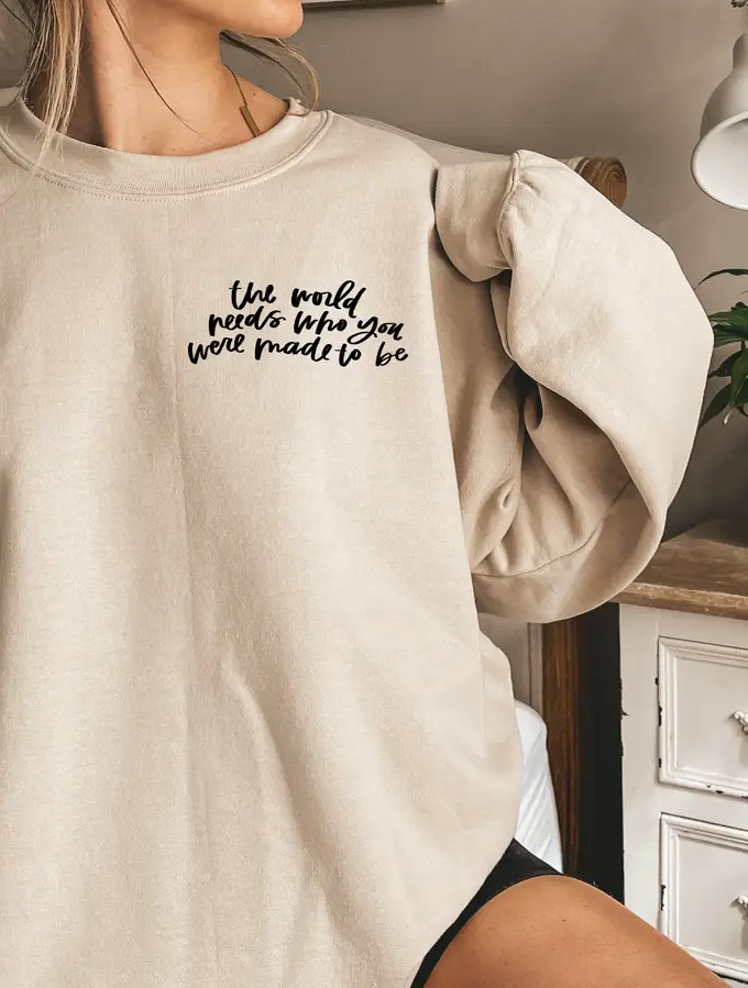 The World Needs Sweatshirt