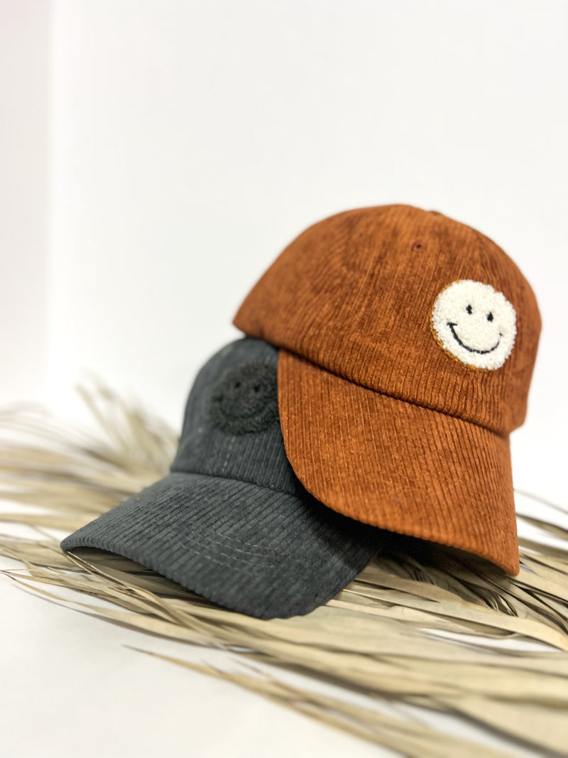Corded Sherpa Happy Face Cap