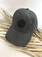 Corded Sherpa Happy Face Cap