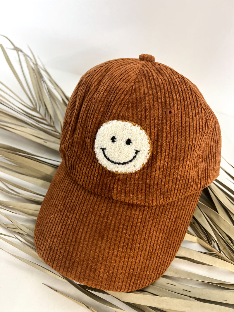 Corded Sherpa Happy Face Cap