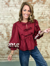 Lori Ann Peplum Top