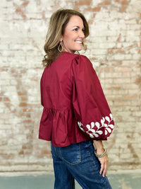 Lori Ann Peplum Top