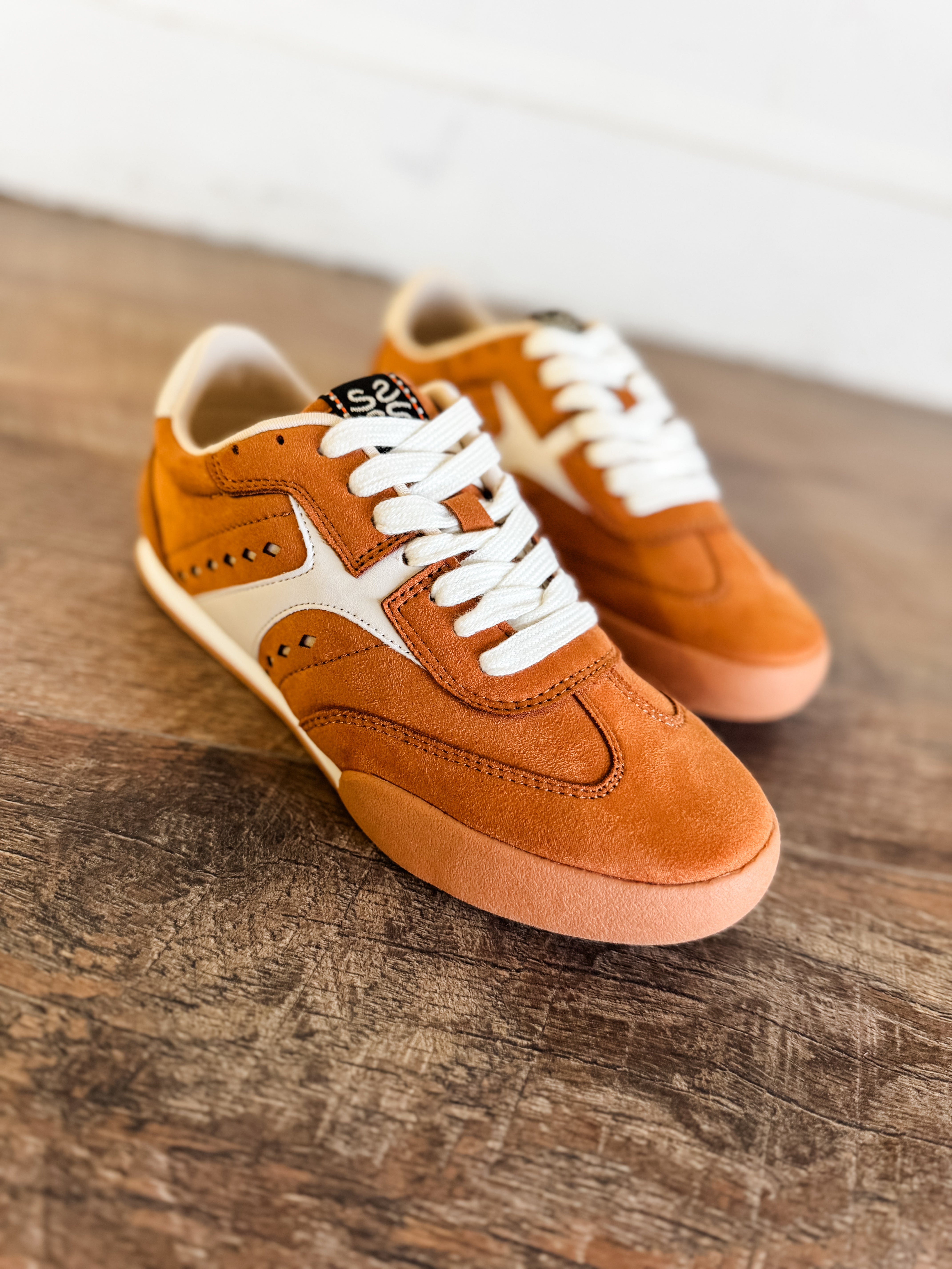 brown and orange sneakers