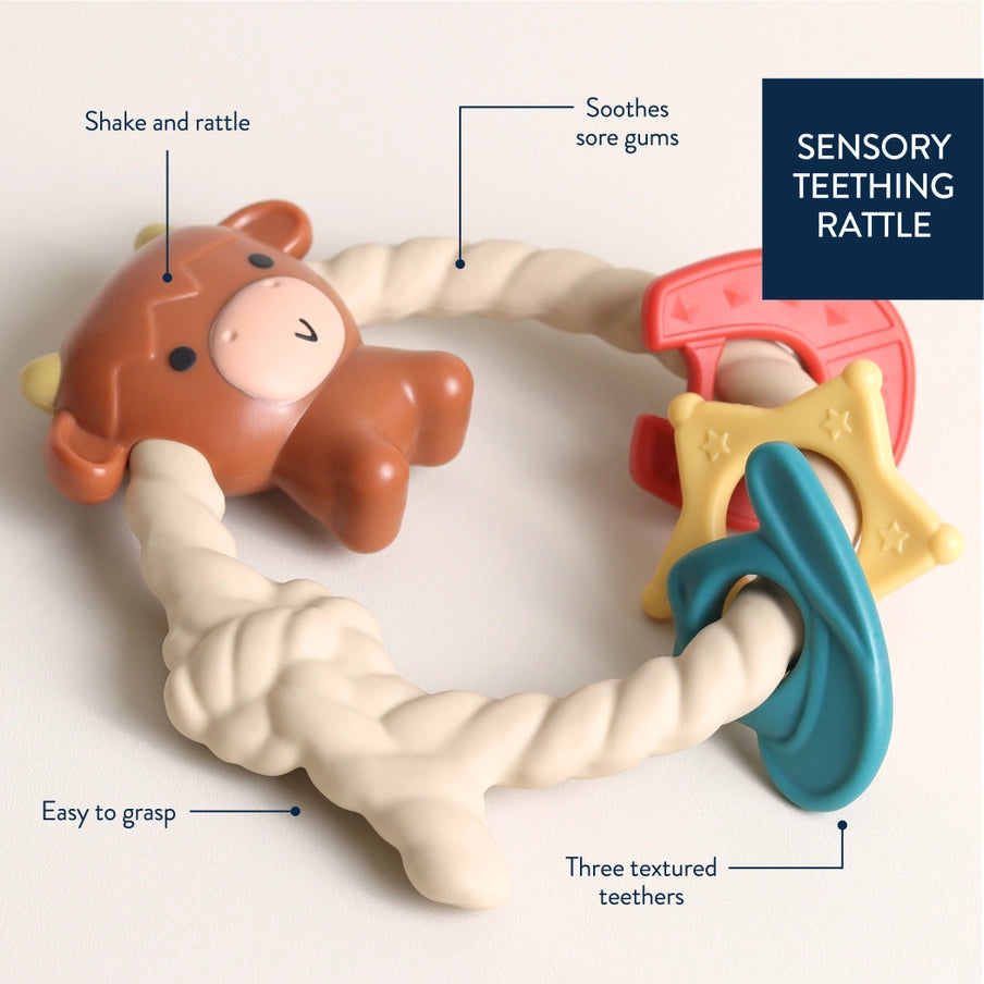 Ritzy Rattle™ Silicone Highland Cow